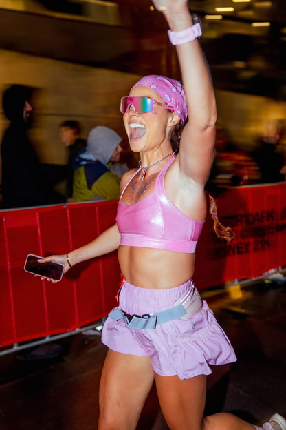 Pink Shield Sport sunglasses styled with a pink race outfit
