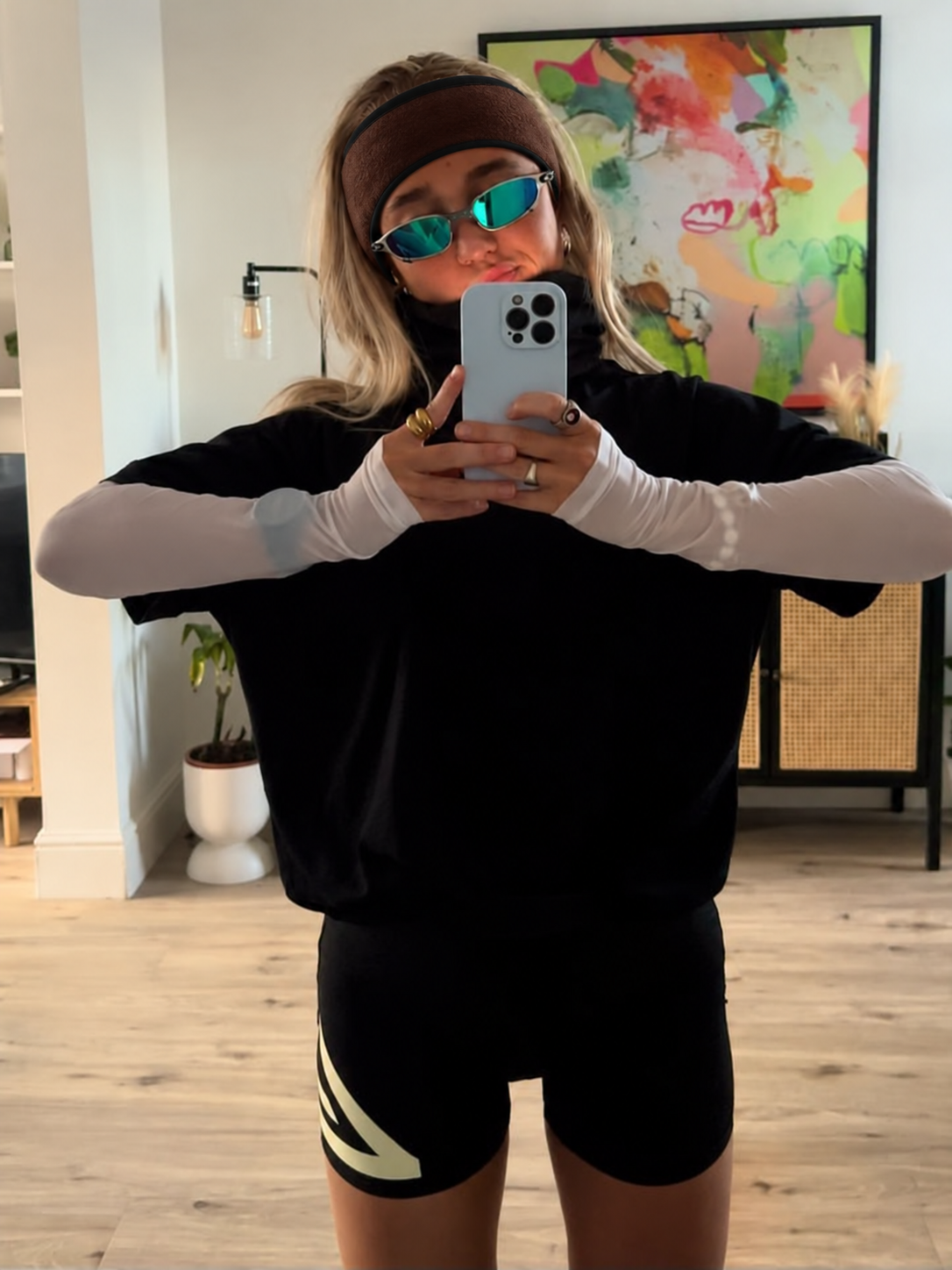 Styled photo composite of brown Cold Pace with layered running clothes
